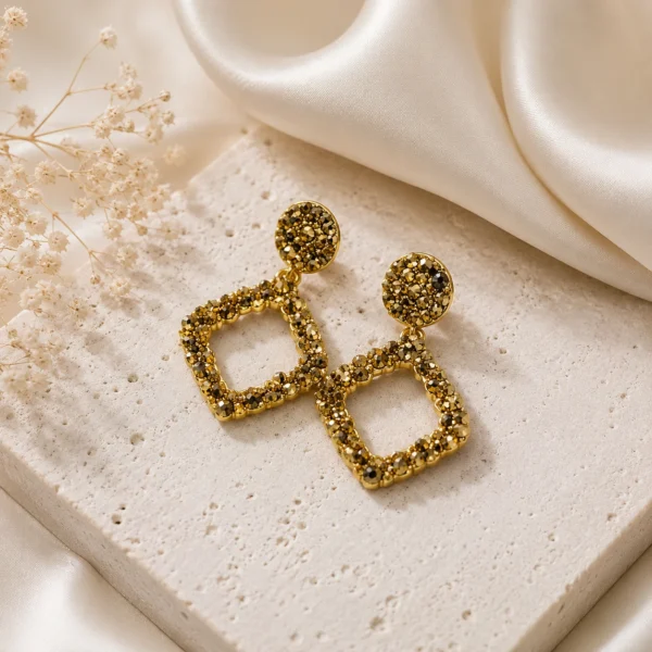 Golden Textured Geometric Drop Earrings Hourglass Veil Hydrating Skin